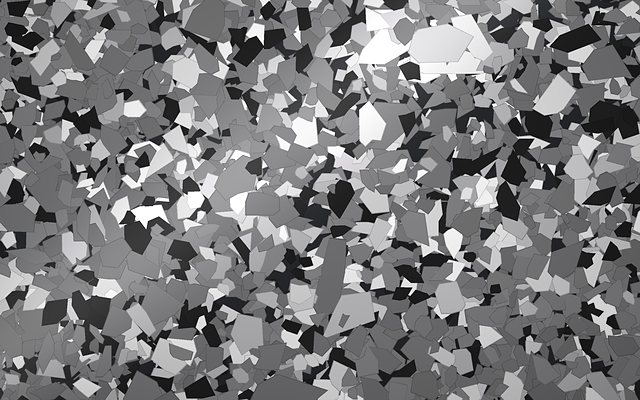 Rendered swatch of Gun Metal flake colors: charcoal with pale gray, white and black